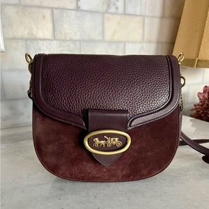 Coach cross body satchel handbag.